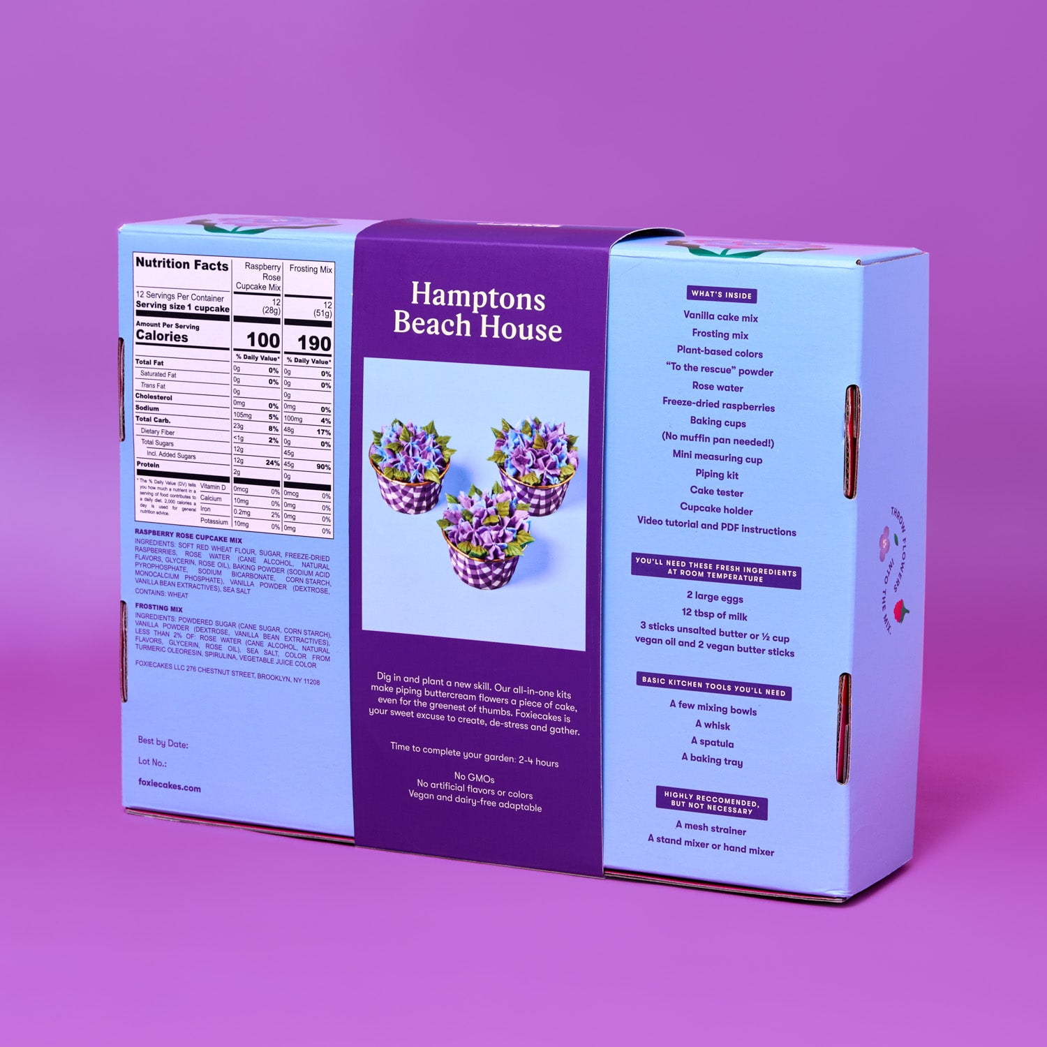 Back of Foxiecakes Hamptons Beach House floral cupcake baking kit box on a purple background, showing nutrition facts, ingredient information, and a list of recommended basic tools you'll need for a beginner-friendly DIY raspberry rose cupcake decorating kit